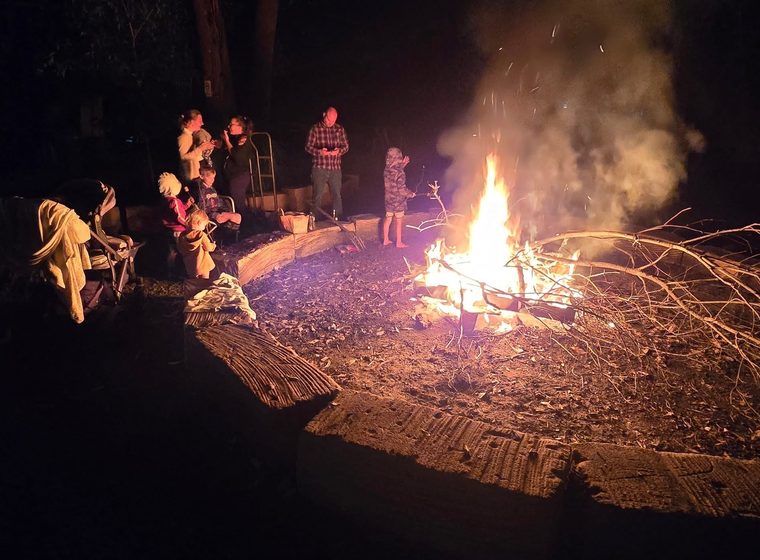 The fire pit going after dark