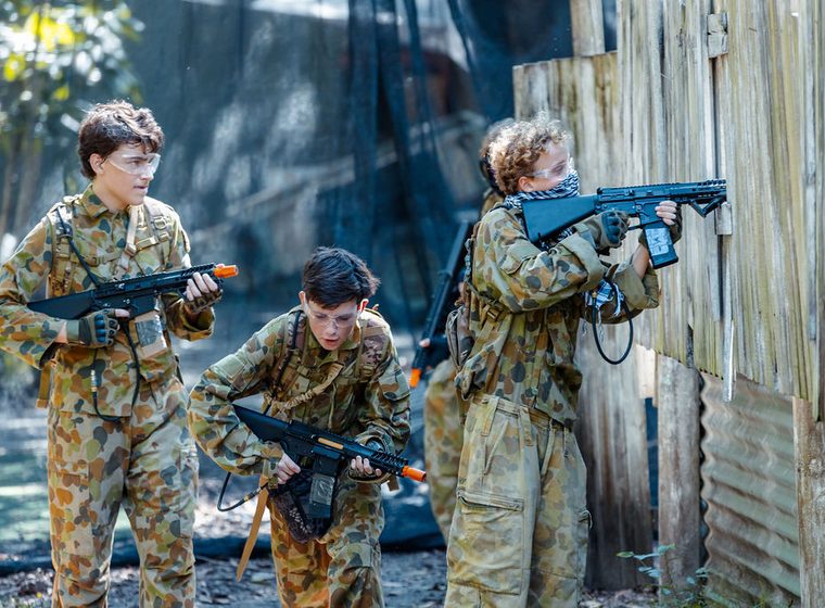 A birthday group in camo gear before the game